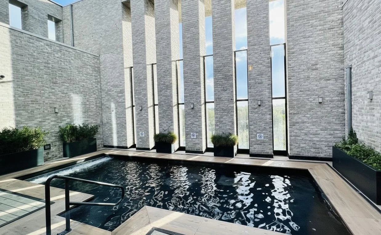 Heated outdoor rooftop pool with Amstel River and Amsterdam skyline views